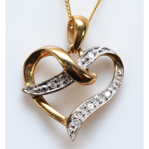 600 - A 9ct gold diamond heart shaped pendant with chain, 15mm across, 1.3g