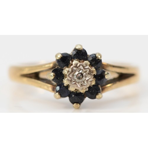 601 - A 9ct gold diamond and sapphire floral cluster ring, single cut diamond, K, 2.6g