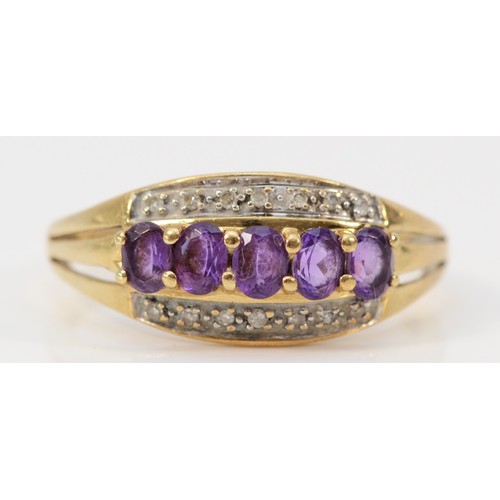 602 - A 9ct gold amethyst and diamond three row ring, U, 2.5g