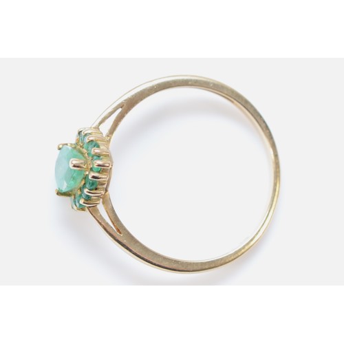 607 - A 9ct gold emerald teardrop cluster ring, P, 2g