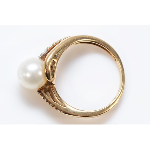 615 - A 9ct gold cultured pearl and diamond dress ring, L, 2.6g