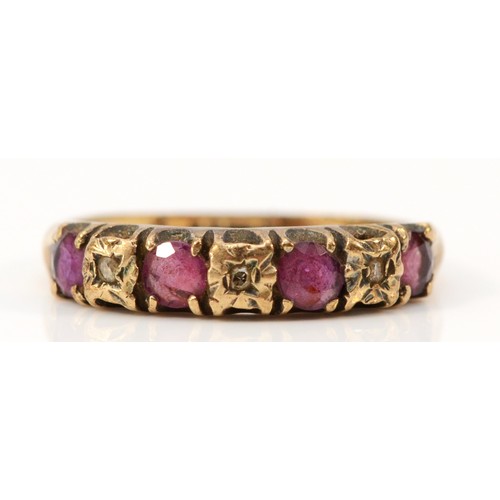 623 - A 9ct gold ruby and diamond seven stone ring, Birmingham 1978, P, 2.1g