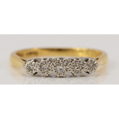 634 - An 18ct gold and platinum five stone single cut diamond ring, inner of the band engraved with the da... 