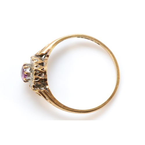 643 - A 9ct gold ruby and diamond cluster ring, K, 1.3g