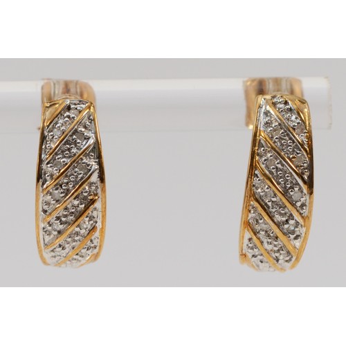 644 - A pair of 9ct gold diamond half hoop earrings with scroll backs, 15mm drop, 2.2g