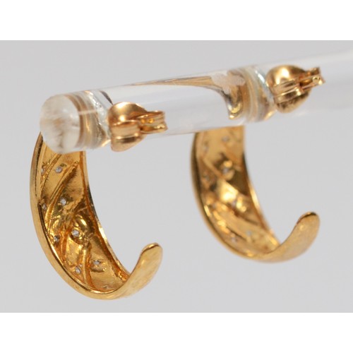 644 - A pair of 9ct gold diamond half hoop earrings with scroll backs, 15mm drop, 2.2g