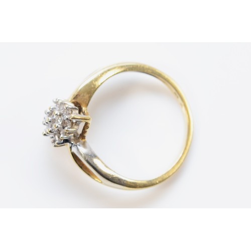 654 - A 9ct gold pave set brilliant cut diamond cluster dress ring, K 1/2, 2.6g