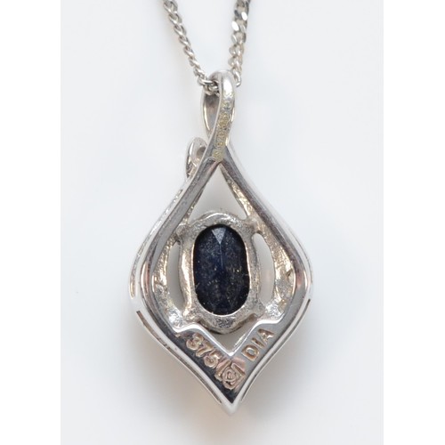 656 - A 9ct white gold sapphire and diamond pendant with chain, 15mm pendant length, 1.6g