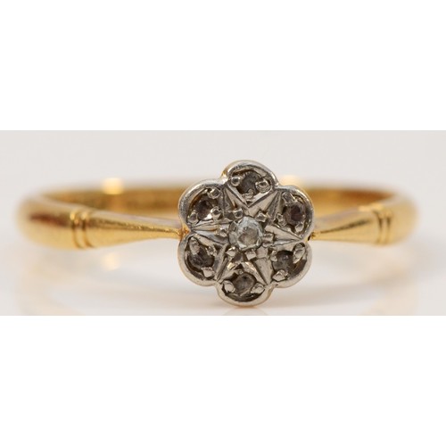 658 - An 18ct gold and diamond floral cluster ring, O, 2g