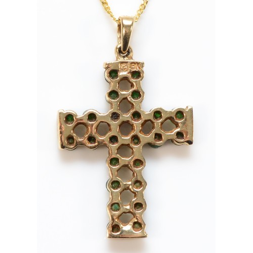 664 - A 9ct gold green gemstone cross pendant with chain, 20mm cross length, 2.5g