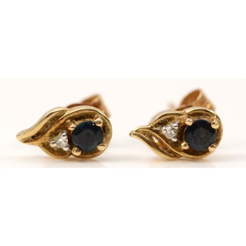 670 - A pair of 9ct gold sapphire and diamond earrings with scroll backs, 10mm total length, 1g