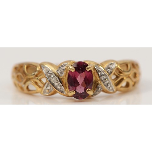 671 - A 9ct gold purple garnet and diamond dress ring, O 1/2, 2.2g