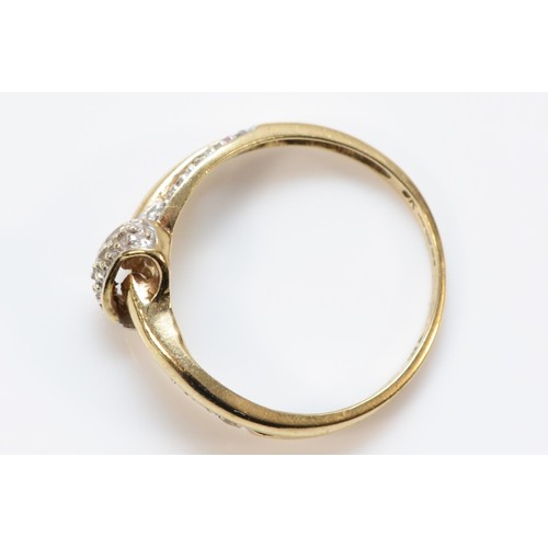 672 - A 9ct gold and diamond twist ring, N, 1.8g