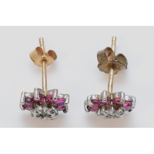 677 - A pair of 9ct gold diamond and ruby flower cluster earrings, 7mm, 1g