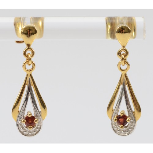 679 - A pair of 9ct gold garnet and diamond drop earrings with scroll backs, 22mm total drop, 1.2g