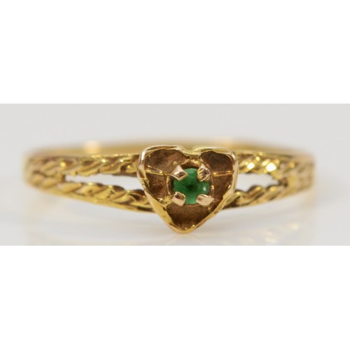 684 - A 9ct gold emerald heart shaped ring with decorative shoulders, M, 0.9g