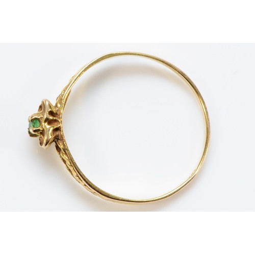 684 - A 9ct gold emerald heart shaped ring with decorative shoulders, M, 0.9g