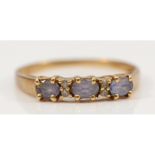 686 - A 9ct gold tanzanite and diamond ring, N, 1.2g