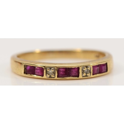 687 - A 9ct gold ruby and diamond half eternity ring, N 1/2, 2g