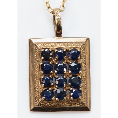 691 - A 9ct gold vintage sapphire pendant with 9ct gold chain, 15mm x 12mm pendant, 3g