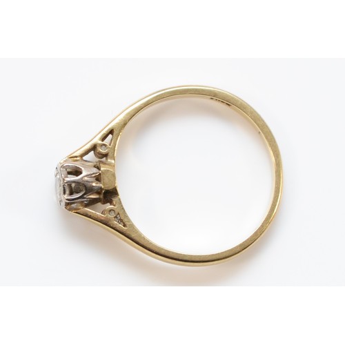 697 - A 9ct gold illusion set diamond single stone ring, London 1986, I 1/2, 1.7g