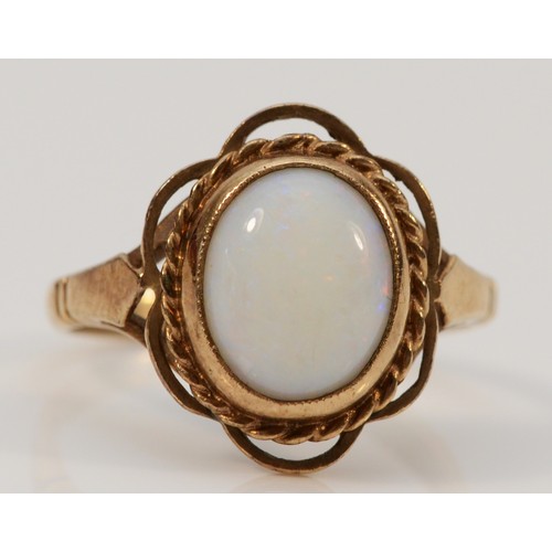 698 - A 9ct gold vintage cabochon cut opal dress ring, K, 2.8g