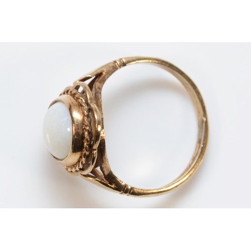 698 - A 9ct gold vintage cabochon cut opal dress ring, K, 2.8g