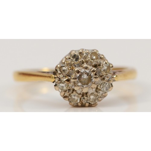 700 - An 18ct gold and platinum diamond cluster ring, L, 3g