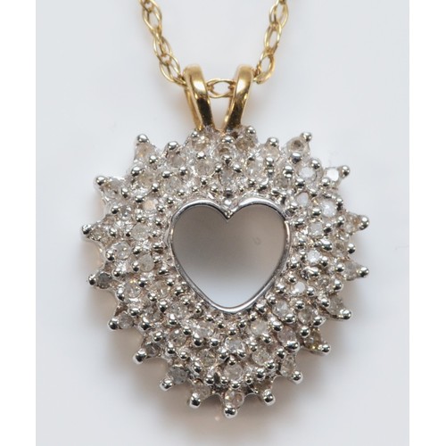 702 - A 9ct gold diamond heart shaped cluster pendant with chain, 15mm across, 3.4g