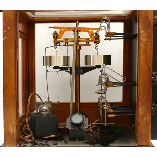 56 - A set of Stanton analytical balance scales, model B.A.6 in glazed wooden case with a twin-pan design... 