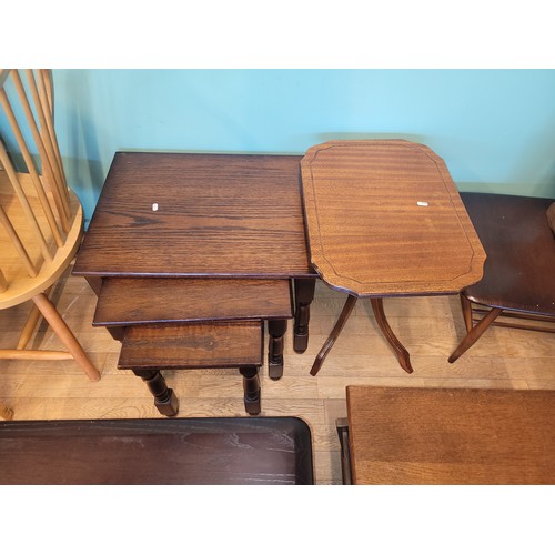 753 - A group of furniture pieces, to include two nest of three tables, three coffee tables, two magazine ... 