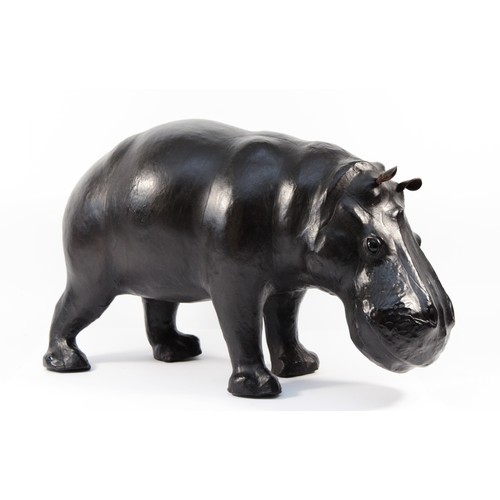 115 - A Liberty of London leather hippopotamus footrest/ornament, H-27cm x 42cm.