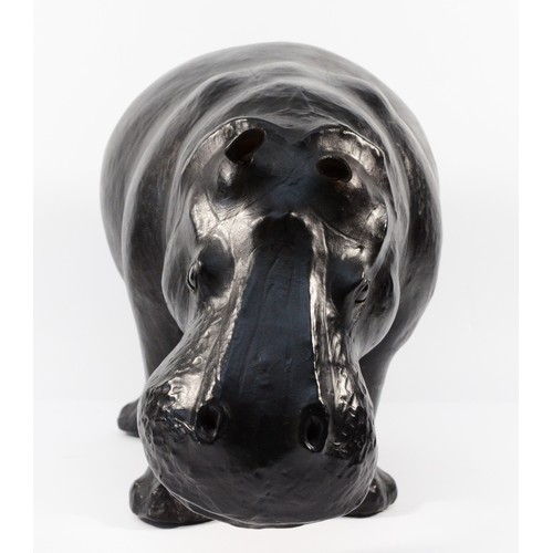 115 - A Liberty of London leather hippopotamus footrest/ornament, H-27cm x 42cm.