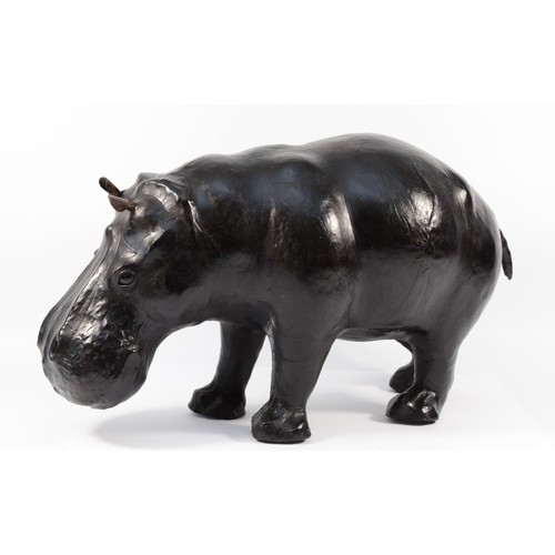 115 - A Liberty of London leather hippopotamus footrest/ornament, H-27cm x 42cm.