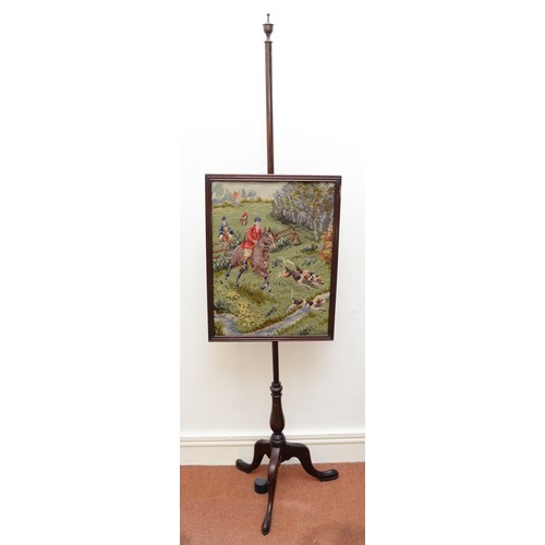 133 - A Victorian mahogany adjustable fireside pole screen, with a needlework tapestry depicting an Englis... 