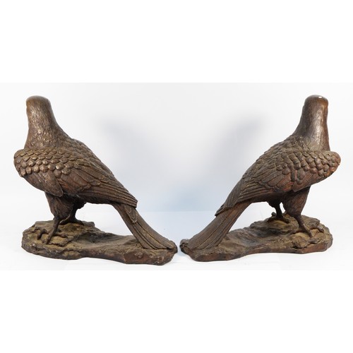 150 - A pair of bronzed resin sculptures of hawks, H-31cm.