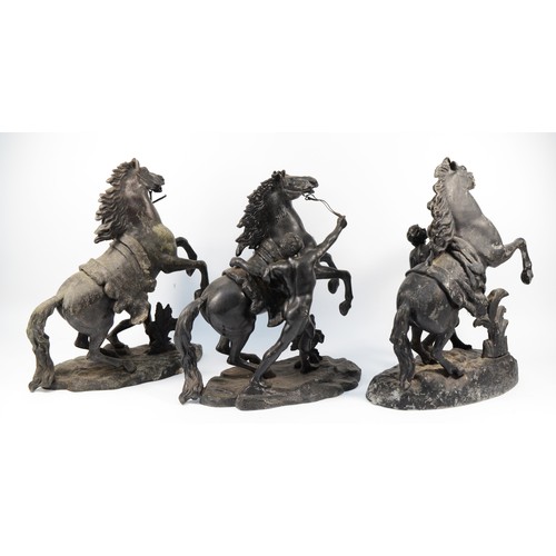 154 - A pair of spelter figurines, depicting rearing Marley horses with their grooms / handlers, H-36, tog... 