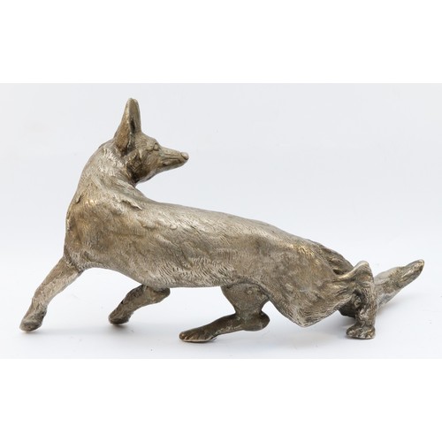 159 - A metal sculpture of a fox, unsigned, paw to tail 53cm