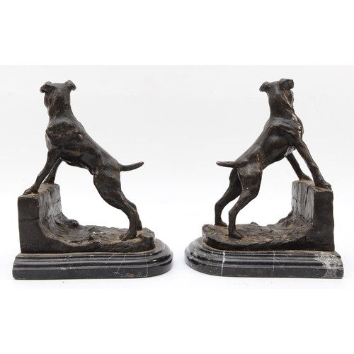 160 - After Edouard Drouot, a pair of bronze barking dog bookends, signed E. Drouot, raised on marble base... 