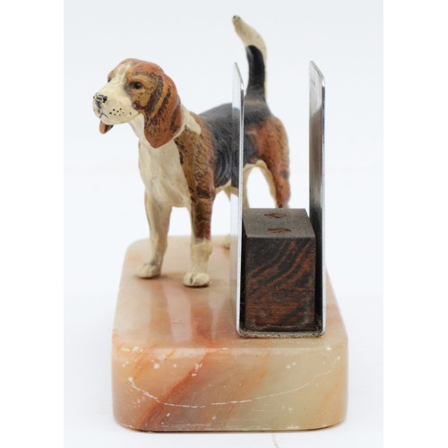 163 - A cold painted bronze of a beagle, raised on an onyx base with match box holder, height 9.5cm