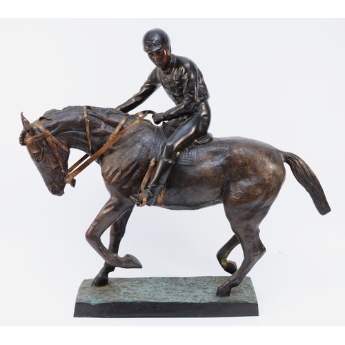 167 - After Mene, a bronze of a racehorse and jockey at a slow trot, raised on cold painted grass base, un... 