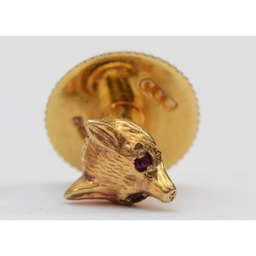 131 - Garrard & Co., a 9ct gold fox head pair of cufflinks, London 1978, ruby set eyes, together with a co... 