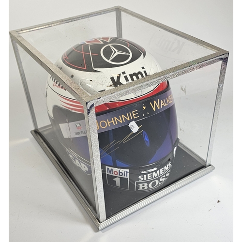 Kimi Raikkonen, a signed replica Index 1:1 racing helmet, signed on the visor on the 5th May 2006, Europe GP, Nurburgring, display case, together with a CoA from Asia Autograph Collectors Club. (2 items)