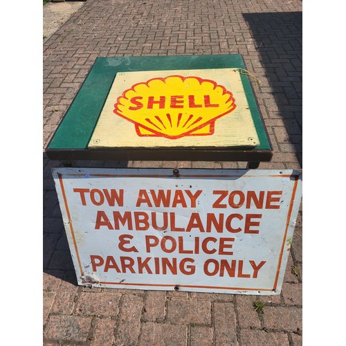 56 - A Shell sign, painted on plywood, approximately 55x56cm, a Tow Away Zone Sign, Alloy plate on plywoo... 