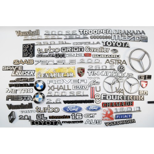 68 - An assortment of vintage car badges for rear and bonnet, to include, Porsche, Vauxhall, Toyota, Troo... 