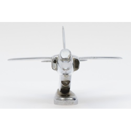 71 - A chrome desk mounted model of a Folland Gnat, stamped to the underside, 'Made by S.E. Kimm, Folland... 