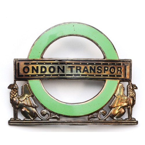 77 - London Transport, a silver and green enamel County Buses and Coaches cap badge, by J.R. Gaunt, Birmi... 