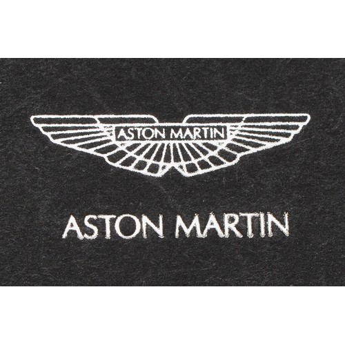 76 - Aston Martin Owners Club, a silver and enamel brooch, by Aston Martin Ltd, London 2004, scratched No... 