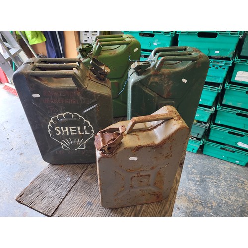 83 - Three 20 litre metal fuel Jerry Cans, plus one (10 litre?) example. (4 items)