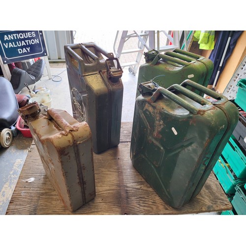 83 - Three 20 litre metal fuel Jerry Cans, plus one (10 litre?) example. (4 items)